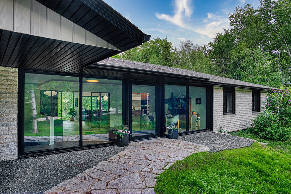 MasterPatio lift and slide doors at the back entrance to modern home