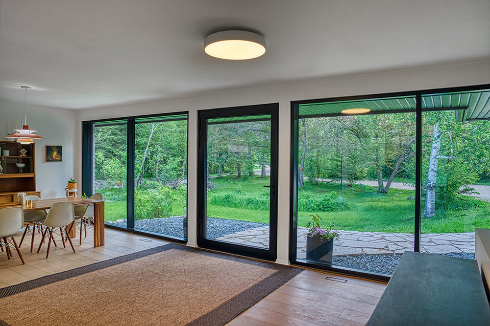 interior of modern bungalow home with ConceptWall 50 HI system windows