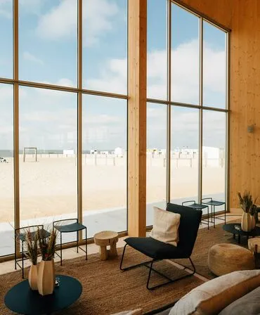 interior of modern house living space with large windows